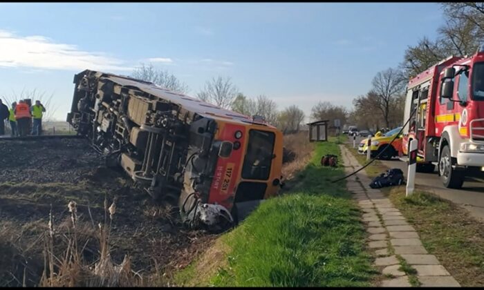 In this video still, a van drove onto the train tracks and was struck by a train in southern Hungary, on April 5, 2022. (Csongrad-Csanad County Police Handout/Screenshot via The Epoch Times)