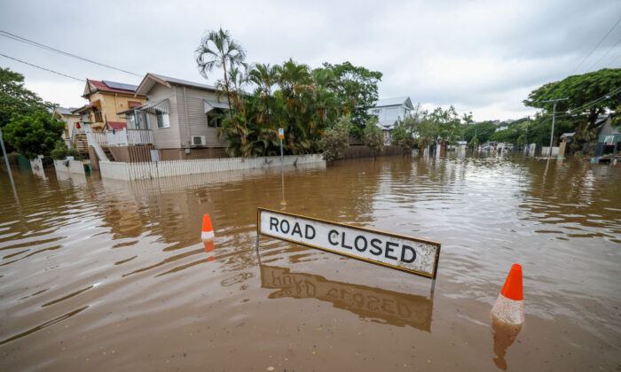 Flooding Tropical Low Heads out to Sea, Warnings Remain