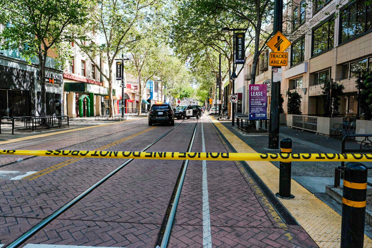 Police work the scene on the corner of 9th and K street after a shooting that occurred in Sacramento, Calif., in the early morning hours on April 3, 2022. (David Odisho/Getty Images)