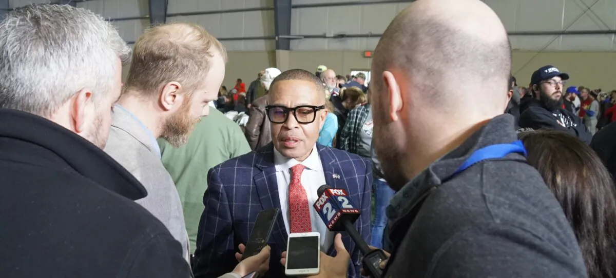 Former Detroit police chief James Craig, candidate for governor of Michigan, talks with reporters at a Trump rally in Macomb County on April 2, 2022. (Steven Kovac/The Epoch Times)