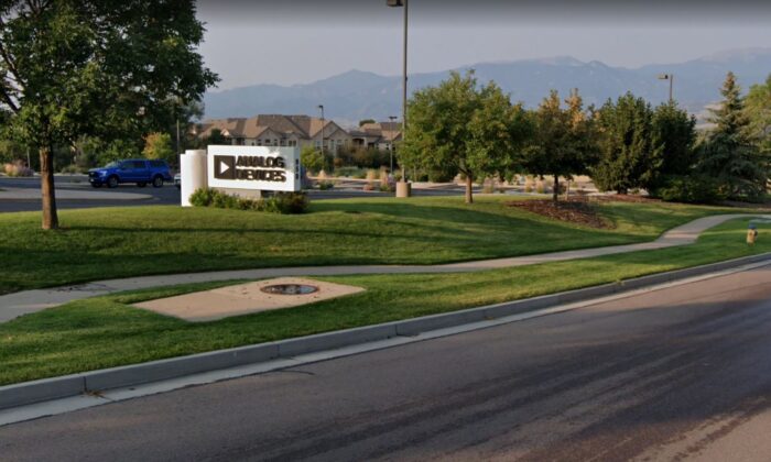 The Analog Devices logo in front of its building in Colorado Springs, Colo., in August 2021. (Google Maps/Screenshot via The Epoch Times)