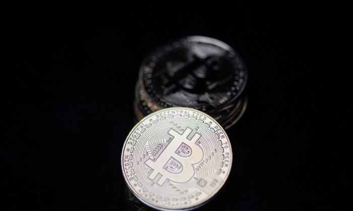 A physical imitation of the Bitcoin crypto currency, Paris, on April 26, 2021. (Martin Bureau/AFP via Getty Images)