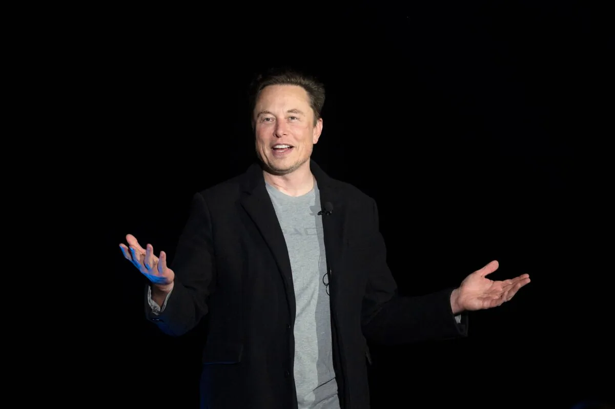 Elon Musk gestures as he speaks at a press conference near Boca Chica Village, Texas, on Feb. 10, 2022. (Jim Watson/AFP via Getty Images)