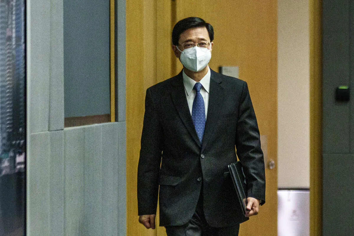 John Lee, Hong Kong's chief secretary, arrives at a press conference in Hong Kong on April 6, 2022. (Lam Yik - Pool/Getty Images)