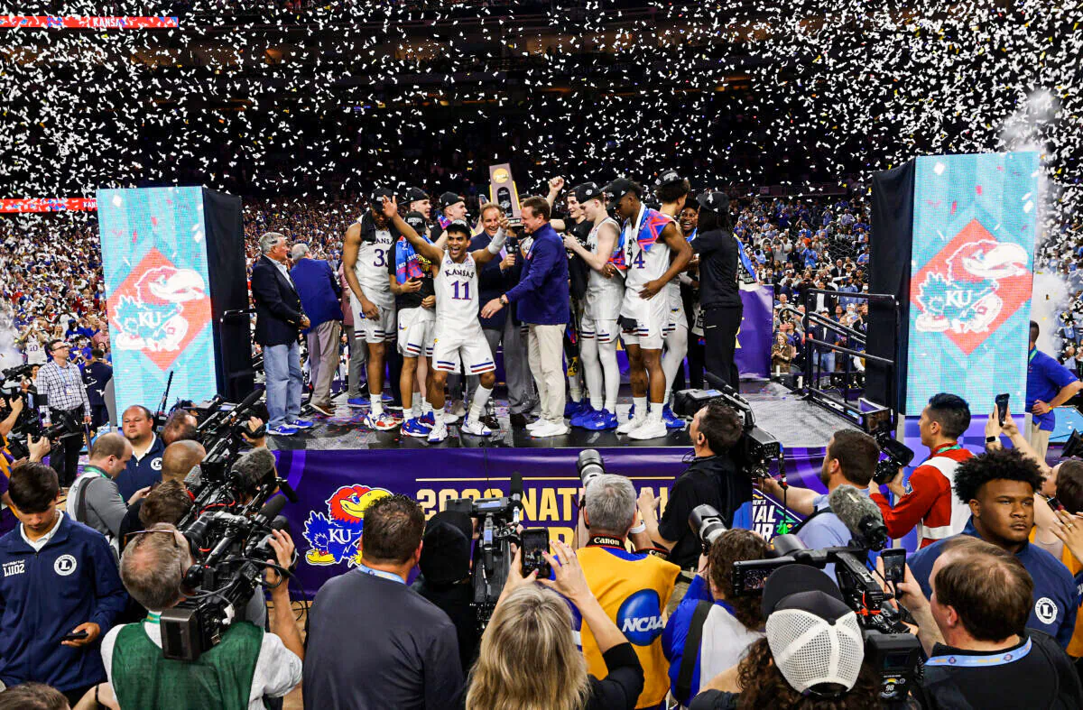 Kansas Jayhawks players celebrate after defeating the North Carolina Tar Heels 72-69 during the 2022 NCAA Men's Basketball Tournament National Championship at Caesars Superdome, in New Orleans, on April 4, 2022. (Jamie Squire/Getty Images)