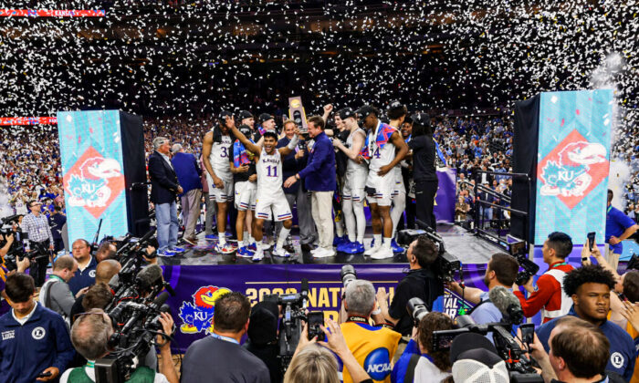 Kansas Jayhawks players celebrate after defeating the North Carolina Tar Heels 72-69 during the 2022 NCAA Men's Basketball Tournament National Championship at Caesars Superdome, in New Orleans, on April 4, 2022. (Jamie Squire/Getty Images)