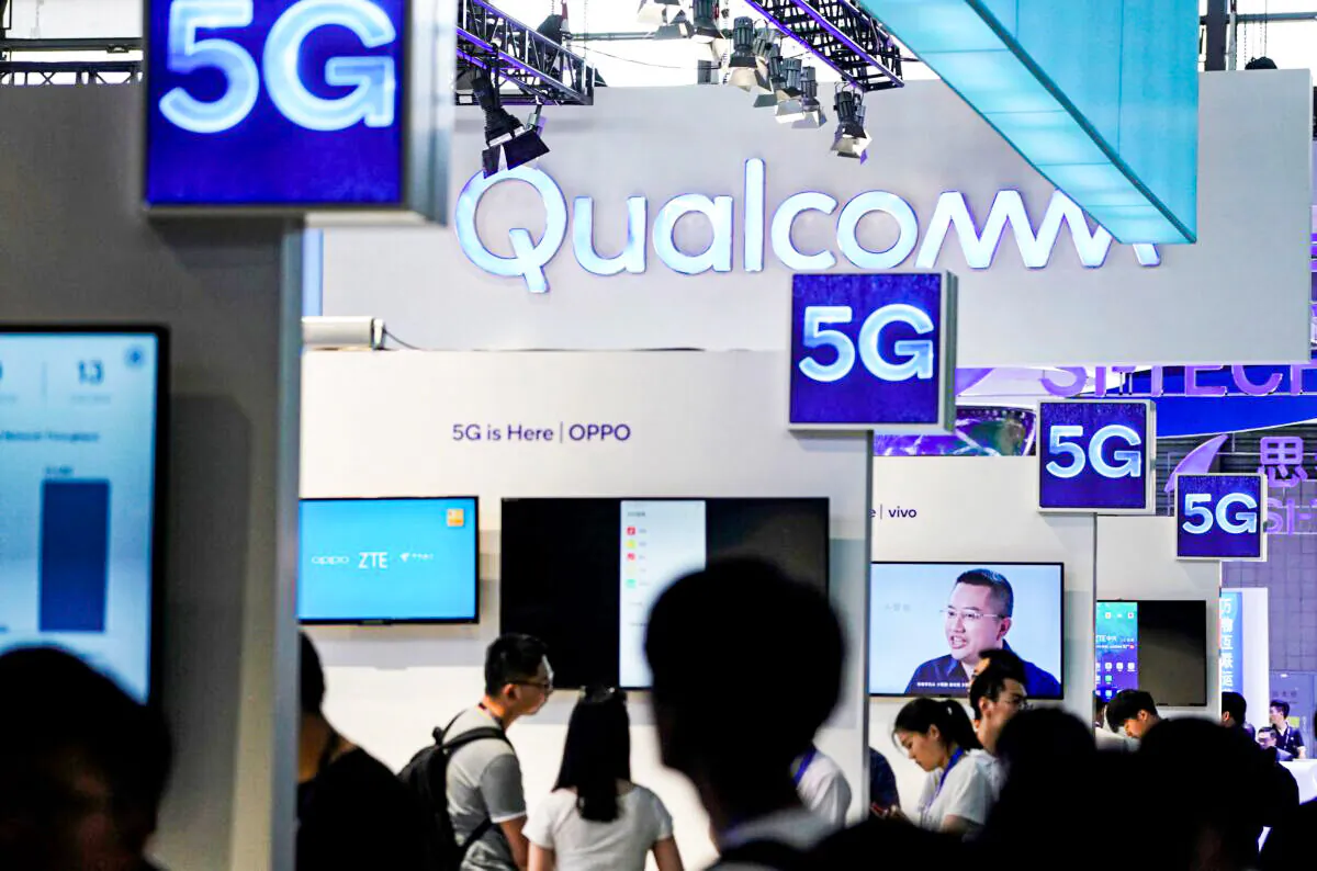 Signs of Qualcomm and 5G at Mobile World Congress (MWC) in Shanghai, China, on June 28, 2019. (Aly Song/Reuters)