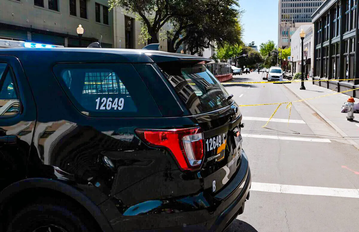 Police car on the corner of 10th and J street after a shooting that occurred in the early morning hours in Sacramento, Calif., on April 3, 2022. (David Odisho/Getty Images)