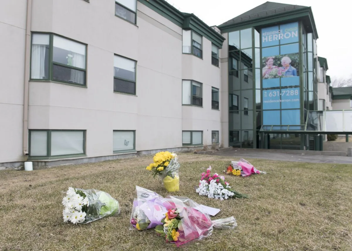Flowers are shown outside Maison Herron, a long term care home in the Montreal suburb of Dorval on April 12, 2020. (The Canadian Press/Graham Hughes)