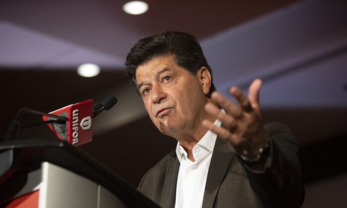 Unifor President Jerry Dias takes a question from a journalist after announcing a three-year labour agreement with the Ford Motor Company at a news conference in Toronto on Sept. 22, 2020. (The Canadian Press/Chris Young)