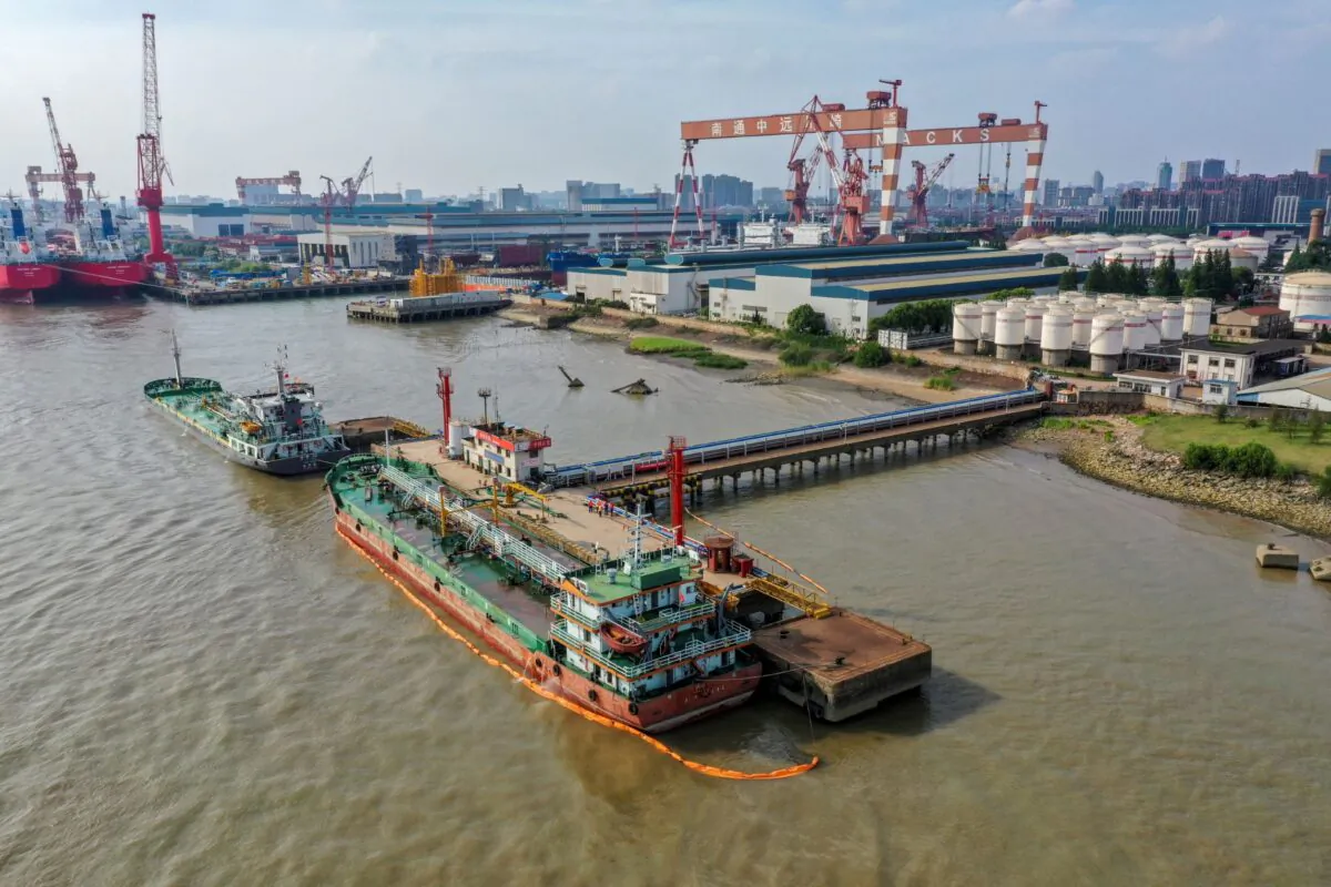 Oil tankers are seen at a terminal of Sinopec Yaogang oil depot in Nantong, Jiangsu Province, China, on June 11, 2019. (Stringer/Reuters)
