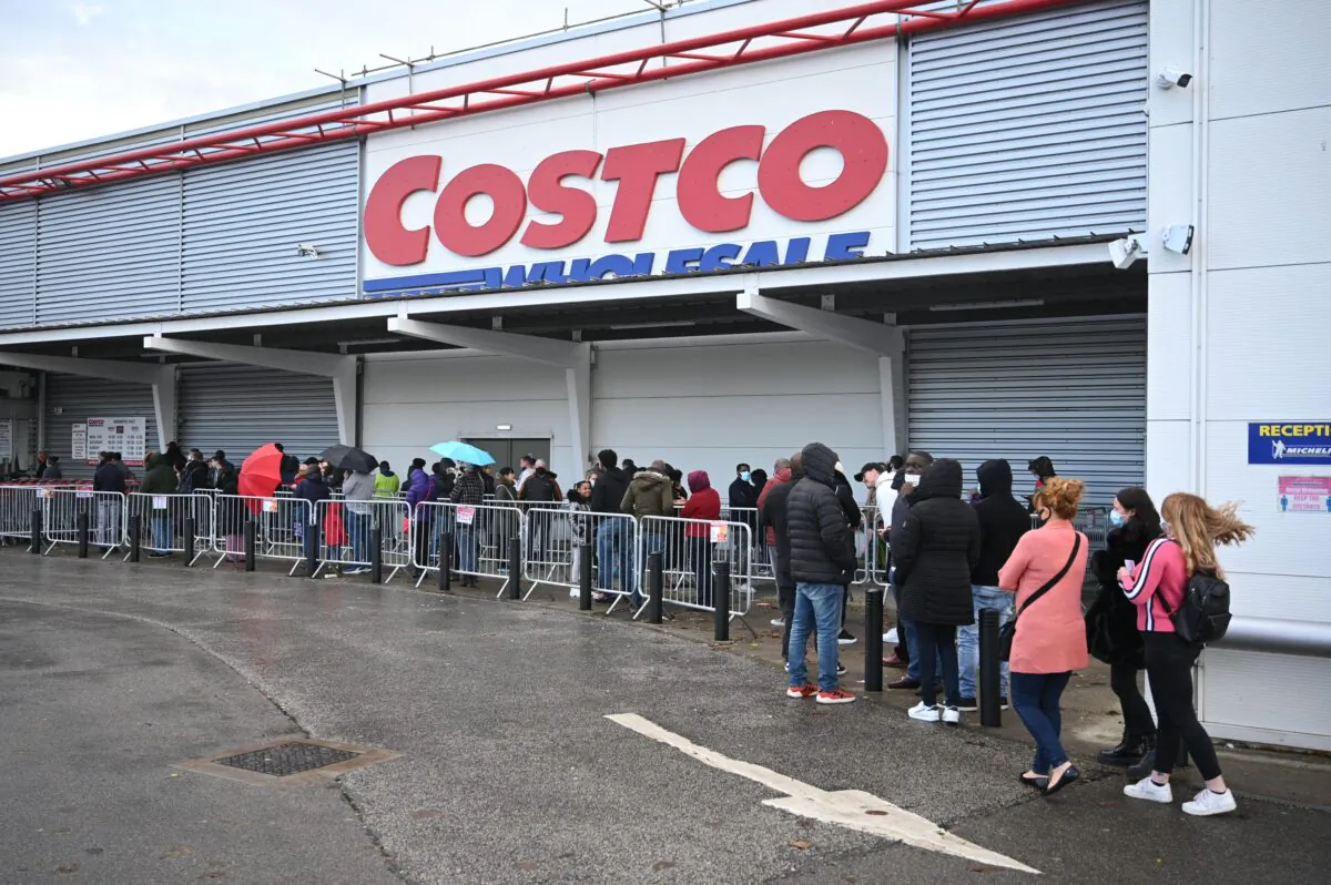 Shoppers queue outside a Costco wholesale store in Leeds, northern England, on Nov. 1, 2020. (Oli Scarff/AFP via Getty Images)