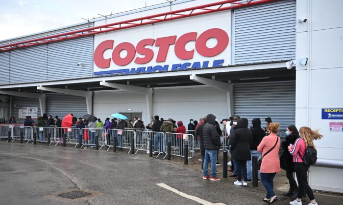 Shoppers queue outside a Costco wholesale store in Leeds, northern England, on Nov. 1, 2020. (Oli Scarff/AFP via Getty Images)