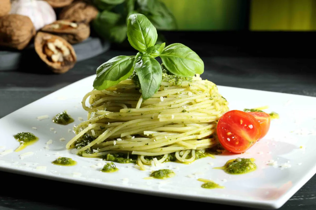 Pesto is traditionally made with crushed basil leaves, garlic, pine nuts and Parmesan cheese blended with olive oil. (denio109/Shutterstock)