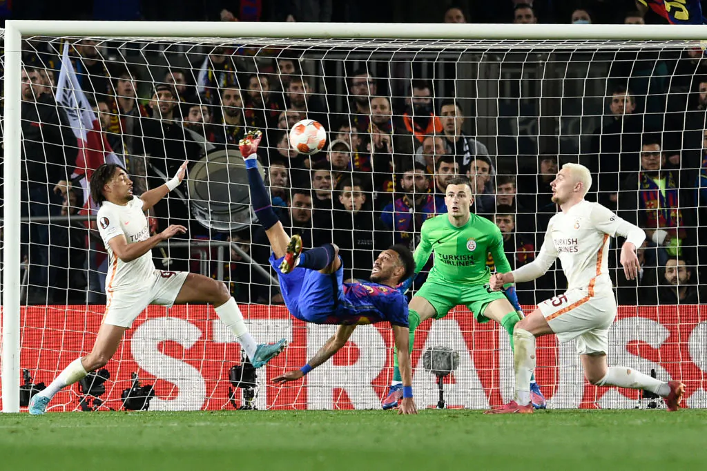 Barcelona's Gabonese midfielder Pierre-Emerick Aubameyang bicycle kicks the ball during the UEFA Europa League round of 16 football match between FC Barcelona and Galatasaray at the Camp Nou stadium in Barcelona on March 10, 2022. (Photo by Josep LAGO / AFP) (Photo by JOSEP LAGO/AFP via Getty Images)