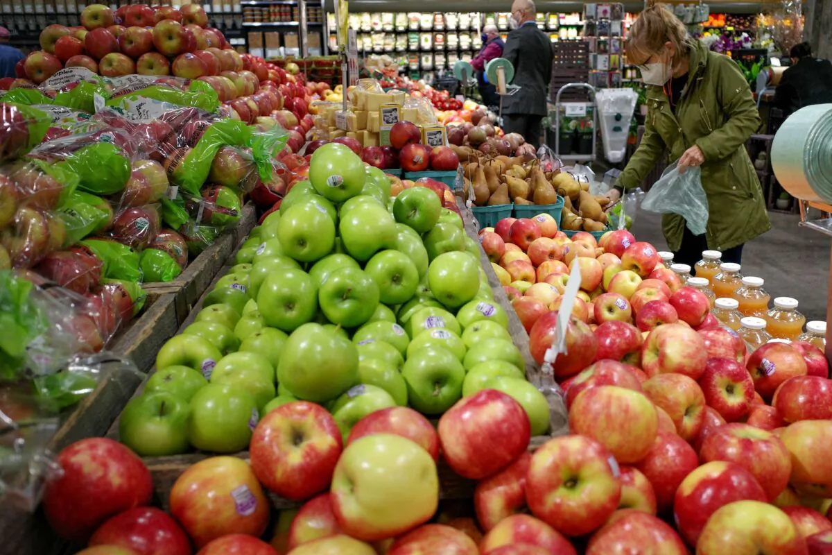 Shoppers are seen inside a supermarket in Chevy Chase, Maryland on February 17, 2022. - US retail sales boomed in January as shops more than regained ground lost in an unexpected December slump, despite high inflation, according to government data released February 16. Retail sales rose 3.8 percent last month, the Commerce Department said, double what was expected and a dramatic reversal of the 2.5 percent decline in December, which was worse than originally reported. (Photo by MANDEL NGAN / AFP) (Photo by MANDEL NGAN/AFP via Getty Images)