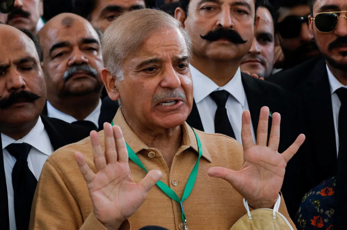 Pakistani Prime Minister Shehbaz Sherif, then-leader of the opposition, gestures as he speaks to the media at the Supreme Court of Pakistan in Islamabad on April 7, 2022. (Akhtar Soomro/Reuters)