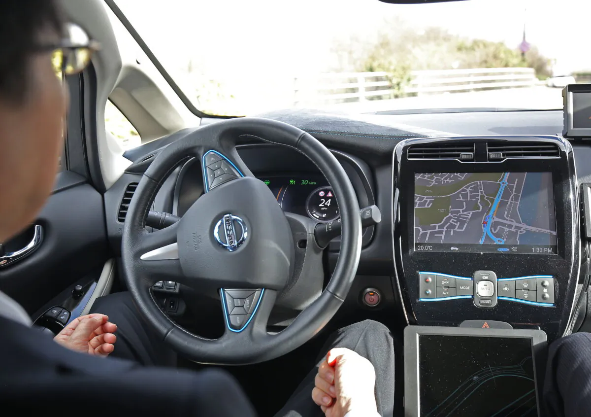Undated file photo showing a motorist sitting behind the wheel. (Philip Toscano/PA Media)