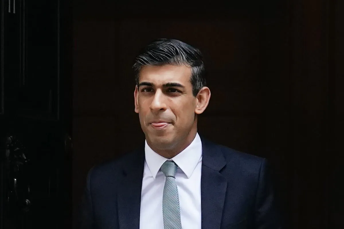 Chancellor of the Exchequer Rishi Sunak leaves 11 Downing Street as he heads to the House of Commons to deliver his Spring Statement in London on March 23, 2022. (Aaron Chown/PA)