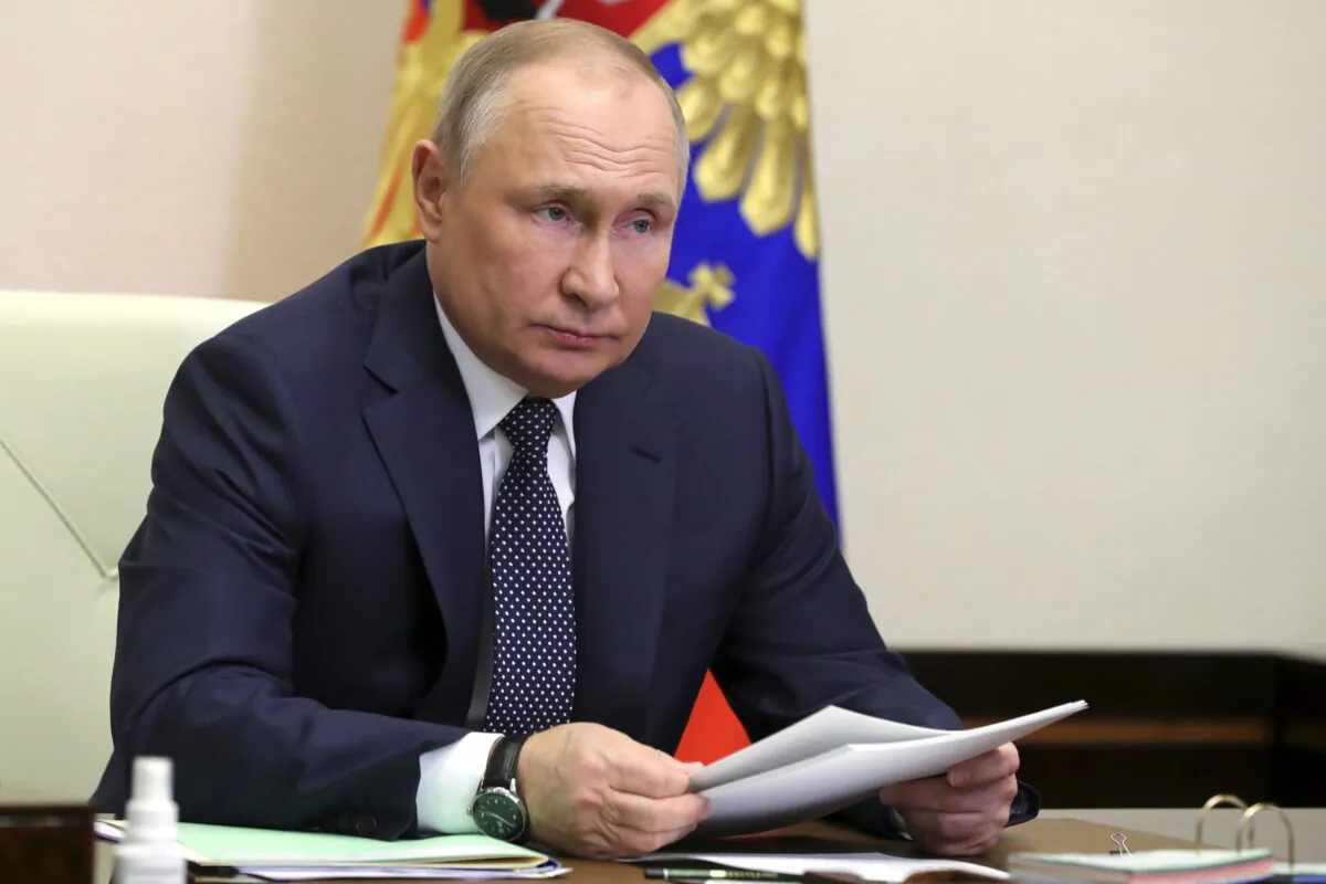 Russian President Vladimir Putin attends a meeting via videoconference in Moscow, Russia, on March 31, 2022. (Mikhail Klimentyev, Sputnik, Kremlin Pool Photo via AP)