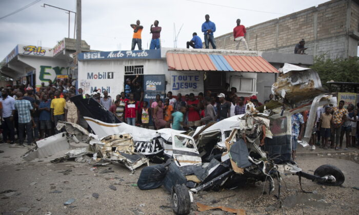 The wreckage of a plane that crashed in the community of Carrefour, Port-au-Prince, Haiti, on April 20, 2022. (Odelyn Joseph/AP Photo)