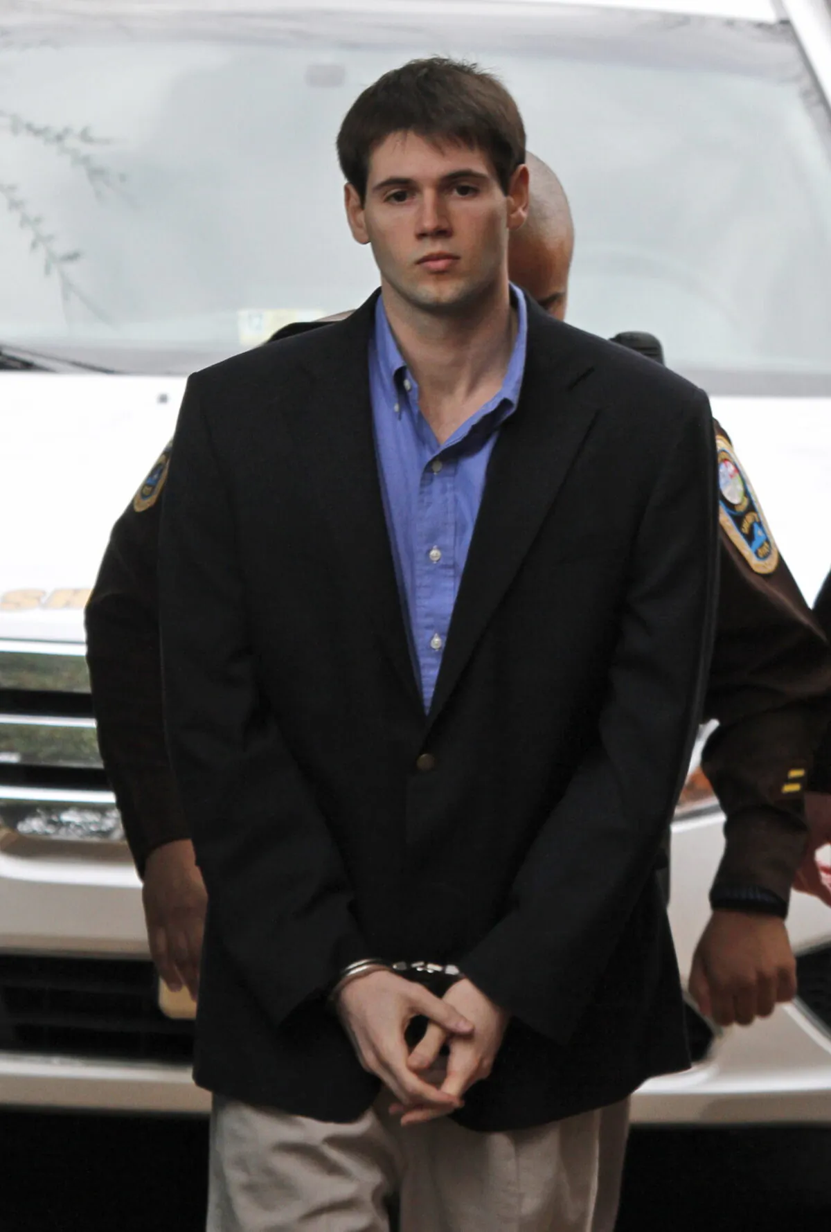 George Huguely is escorted into the Charlottesville Circuit courthouse in Charlottesville, Va., on Feb. 22, 2012. (Steve Helber/AP Photo)