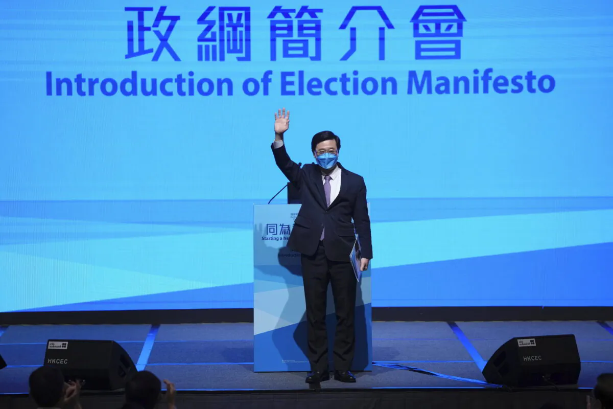 John Lee, former No. 2 official in Hong Kong, and the only candidate for the city's top job, announces his manifesto during the 2022 chief executive electoral campaign in Hong Kong, Friday, April 29, 2022. (Kin Cheung/AP Photo)