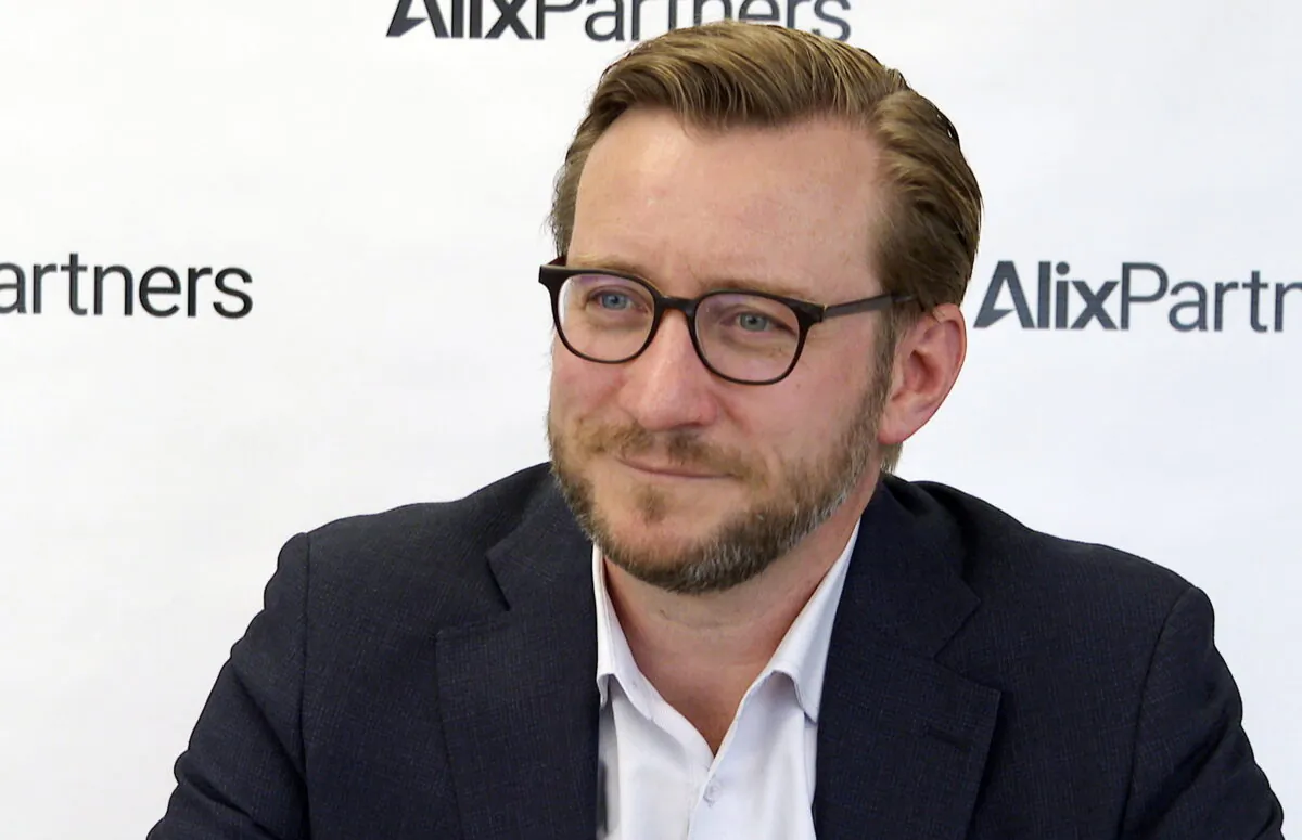 Mark Wakefield, co-leader of AlixPartners’ global automotive unit, speaks during an interview with The Associated Press at the consulting firm’s offices in Southfield, Mich., on March 21, 2022. (Mike Householder/AP Photo)