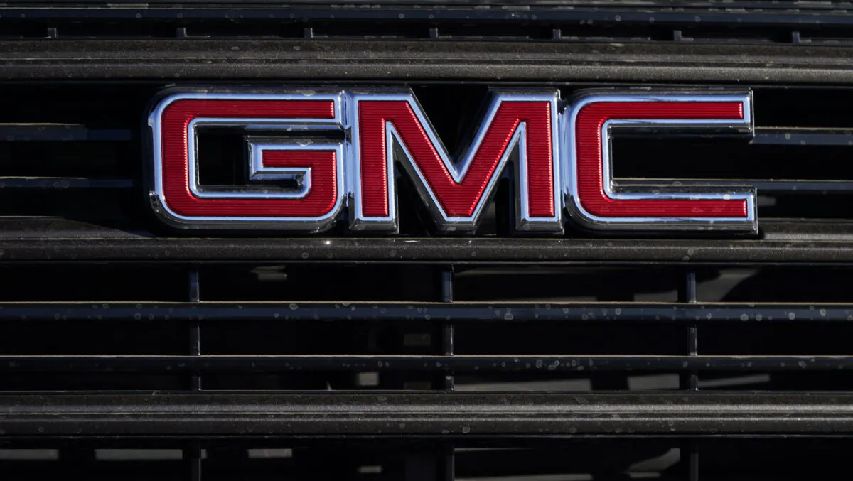 A GMC company logo is displayed at a GMC Truck dealership in Castle Rock, Colo., on Feb. 7, 2021. (David Zalubowski/AP Photo)
