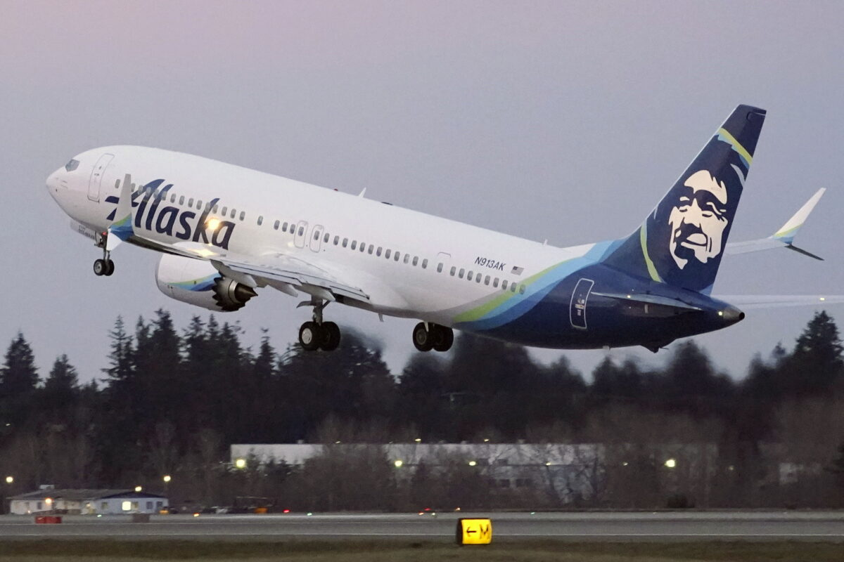 The first Alaska Airlines passenger flight on a Boeing 737-9 Max airplane takes off on a flight to San Diego from Seattle-Tacoma International Airport in Seattle, on March 1, 2021. (Ted S. Warren/AP Photo)
