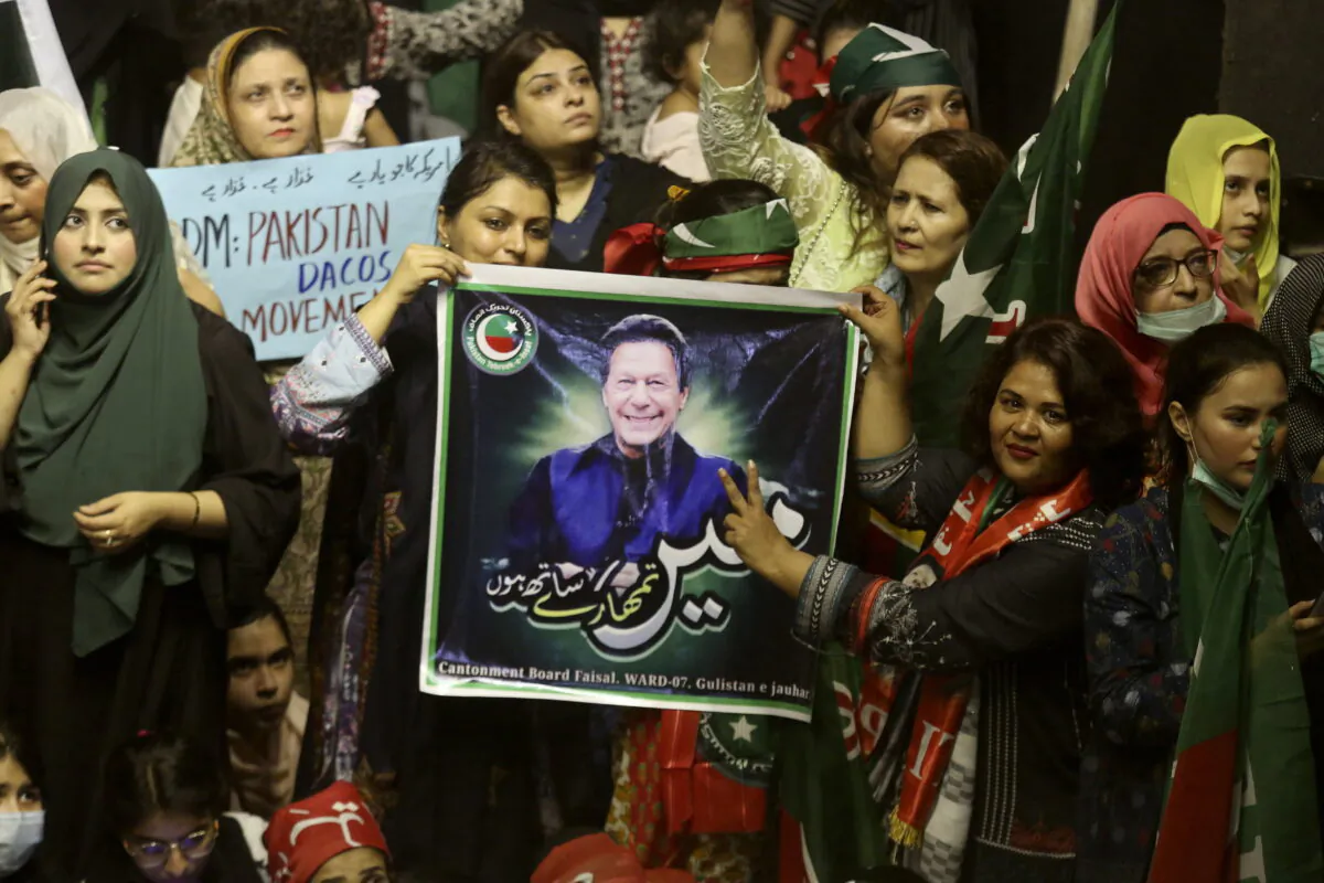 Supporters of deposed Prime Minister Imran Khan's party participate in a rally to condemn the ouster of their leader's government, in Karachi, Pakistan, on April 10, 2022. (Fareed Khan/AP Photo)