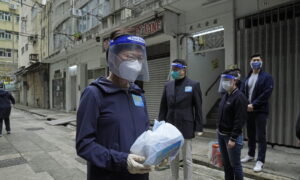 Hong Kong Urges Testing, Shanghai Struggles Under Lockdown