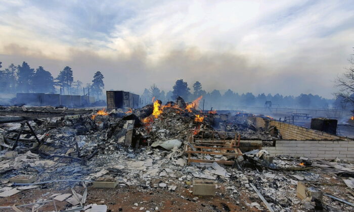 Bill Wells's home on the outskirts of Flagstaff, Ariz., destroyed by a wildfire on April 19, 2022. (Bill Wells via AP)