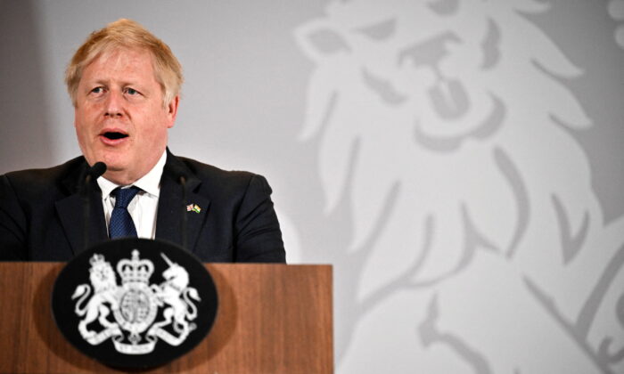 British Prime Minister Boris Johnson speaks during a news conference in New Delhi, India, on April 22, 2022. (Ben Stansall/Pool via Reuters)