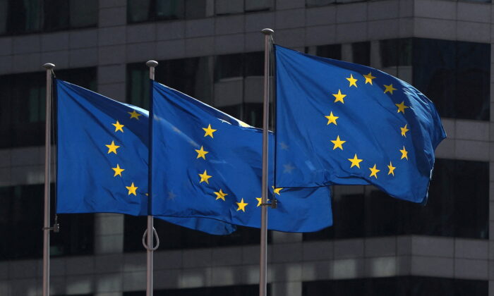 FILE PHOTO: European Union flags fly outside the European Commission headquarters in Brussels, Belgium, April 10, 2019. (Reuters/Yves Herman)
