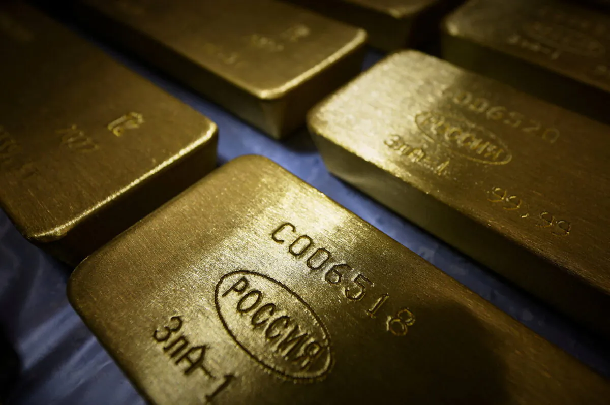 FILE PHOTO: Marked ingots of 99.99 percent pure gold are placed in a cart at the Krastsvetmet non-ferrous metals plant in the Siberian city of Krasnoyarsk, Russia March 10, 2022. REUTERS/Alexander Manzyuk/