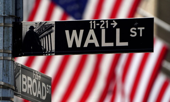 A Wall Street sign is pictured outside the New York Stock Exchange in the Manhattan borough of New York City, New York, on April 16, 2021. (Carlo Allegri/Reuters)