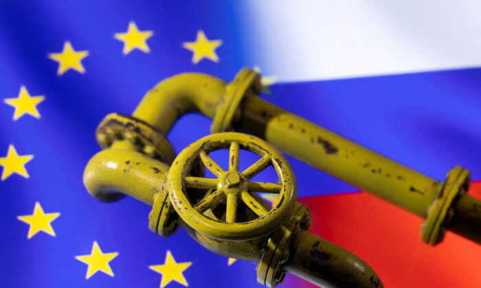 A 3D printed Natural Gas Pipes are placed on displayed EU and Russian flags in this illustration taken, on Jan. 31, 2022. (Dado Ruvic/Reuters)