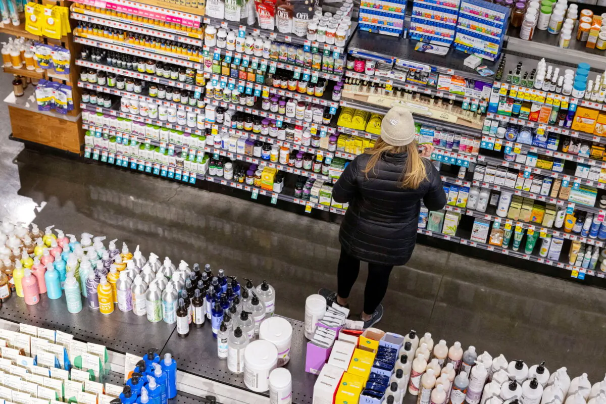 A person shops in a supermarket in Manhattan, New York, on March 28, 2022. (Andrew Kelly/Reuters)