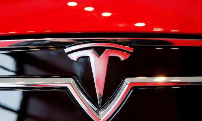 A Tesla logo on a Model S inside of a Tesla dealership in New York on April 29, 2016. (Lucas Jackson/Reuters)