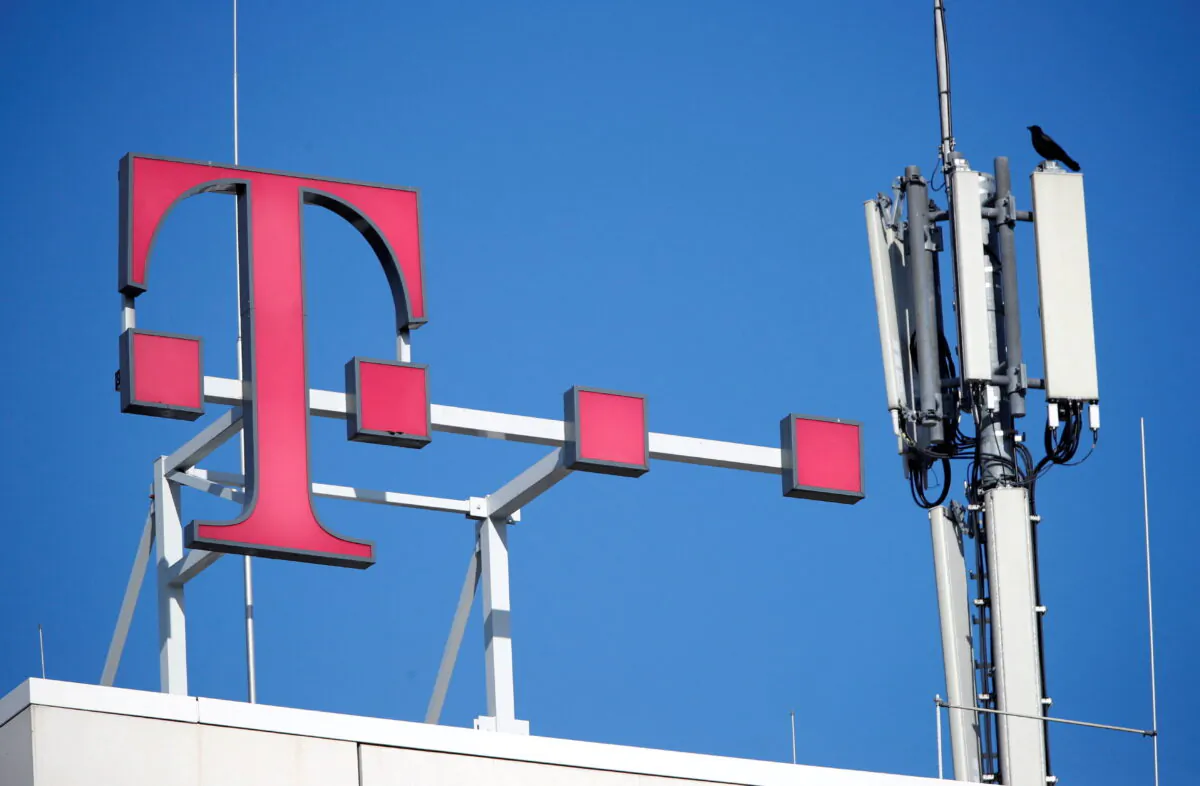 The GSM mobile phone antennas of Deutsche Telekom AG atop the German telecoms giant's headquarters in Bonn, Germany. (Wolfgang Rattay/Reuters)