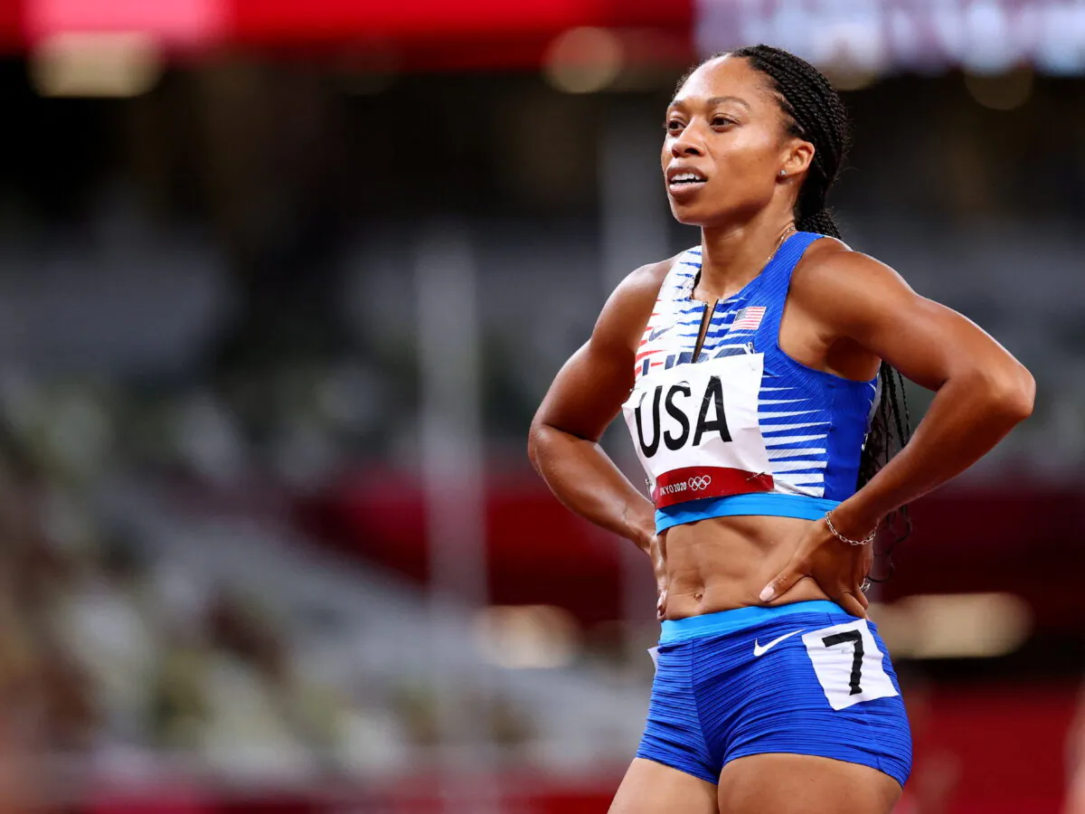 Allyson Felix of the United States reacts after winning gold during the Tokyo 2020 Olympics Athletics for Women's 4 x 400m Relay Final, at the Olympic Stadium in Tokyo, on Aug. 7, 2021. (Lucy Nicholson/Reuters)