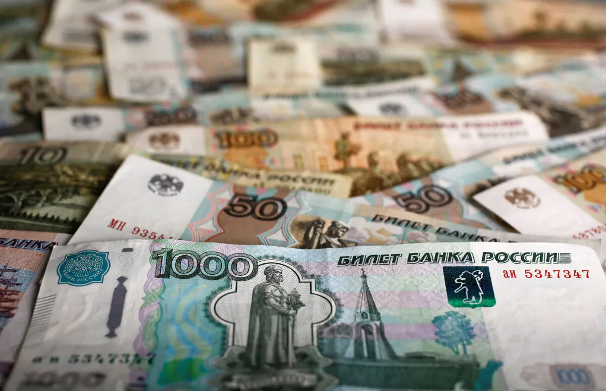 A picture illustration shows Russian ruble banknotes of various denominations on a table in Warsaw, Poland, on Jan. 22, 2016. (Kacper Pempel/Reuters)