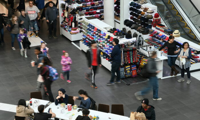 Shoppers look for deals at the Pentagon City Mall in Arlington, Va., on Nov. 29, 2019. (Loren Elliott/Reuters)