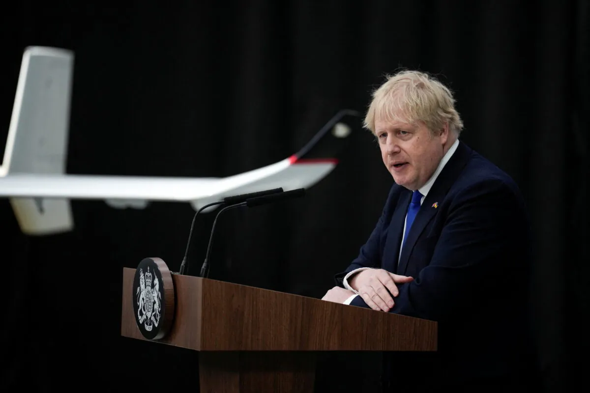 British Prime Minister Boris Johnson delivers a speech on immigration, at Lydd Airport, Britain, April 14, 2022. (Matt Dunham/Pool/Reuters)