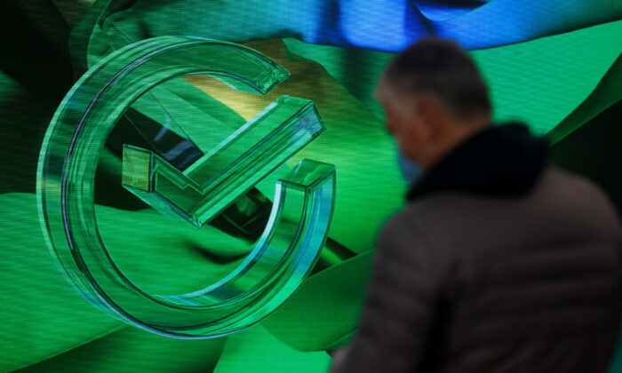 The logo is on display in an office of the Russian largest lender Sberbank in Moscow, Russia, on Dec. 24, 2020. (Maxim Shemetov/Reuters)
