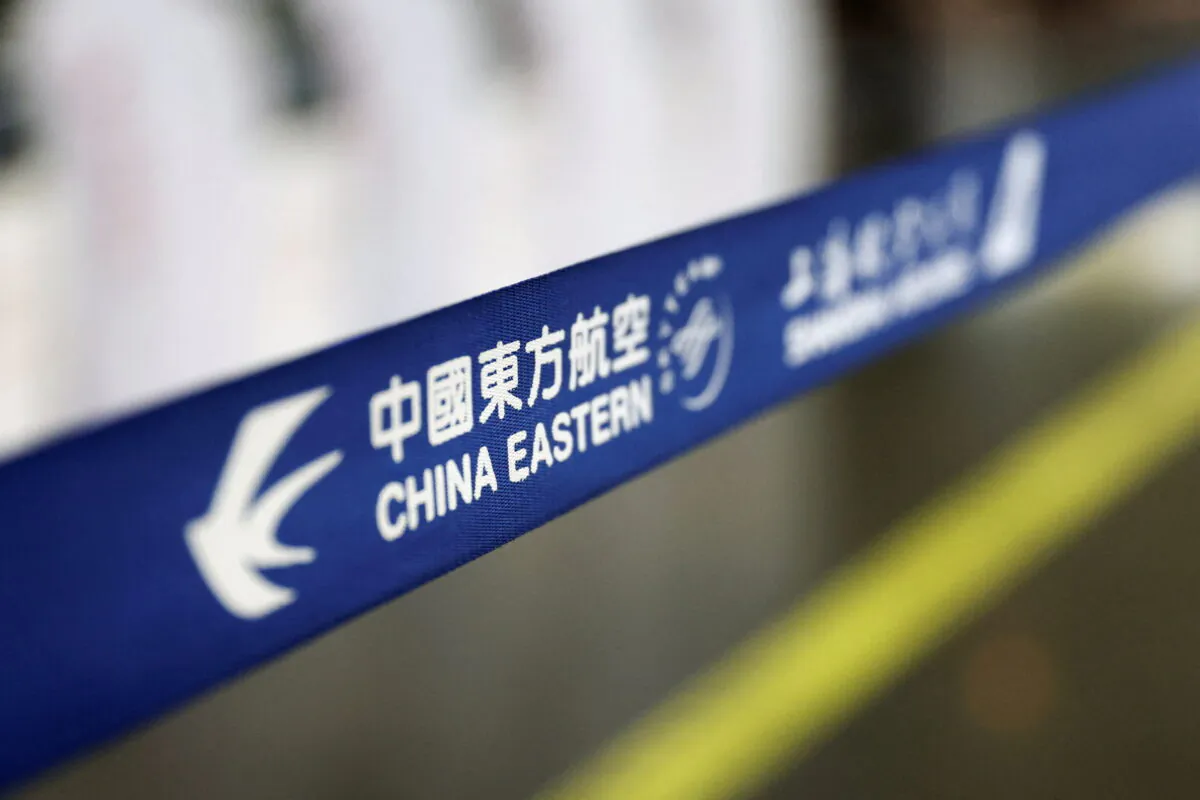 The logo of China Eastern Airlines is pictured at Beijing Capital International Airport in Beijing on March 21, 2022. (Tingshu Wang/Reuters)