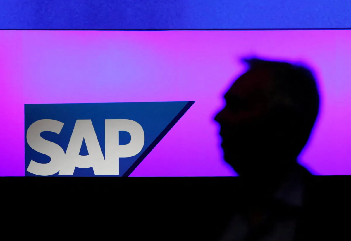 A man walks past a SAP logo during the company's annual general meeting in Mannheim, Germany, on May 15, 2019. (Ralph Orlowski/Reuters)