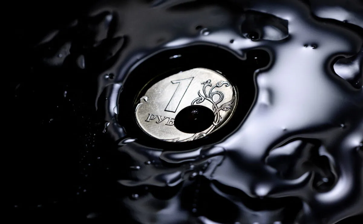 A Russian one ruble coin is seen in this picture illustration taken on April 5, 2022. (Maxim Shemetov/Illustration/Reuters)