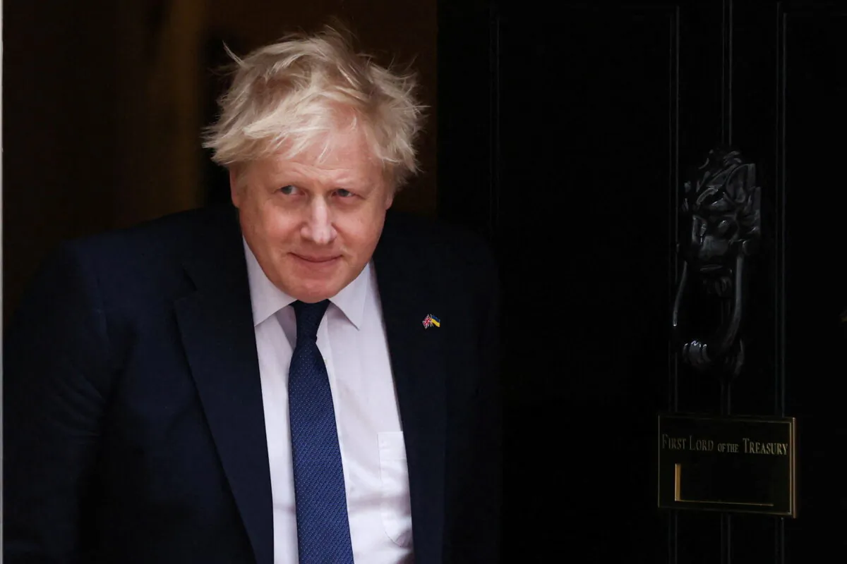 British Prime Minister Boris Johnson walks in Downing Street in London, on April 5, 2022. (Reuters/Tom Nicholson/File Photo)